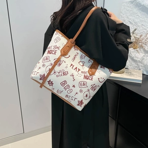 Sac fourre-tout contrasté avec imprimé graffiti et lanières en cuir marron pour femme