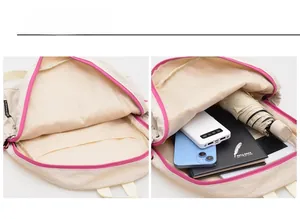 Internal view of cream canvas backpack showing spacious main compartment and pockets