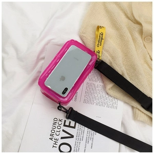 Macro shot of rose red transparent PVC jelly bag holding a smartphone for scale