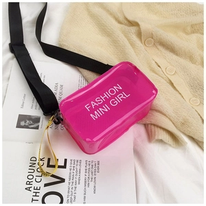 Detail view of pink transparent jelly saddle bag with fashion mini girl printing