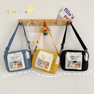 Sac bandoulière japonais en toile bleu jaune et noir avec joli lapin en peluche