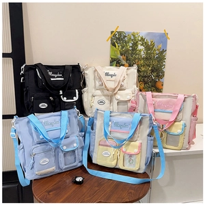 Detailed view of lightweight nylon messenger bags in various colors with multi-pocket design