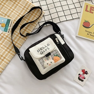 Sac bandoulière en toile noir et blanc style japonais avec décor lapin et motif Hello Girl