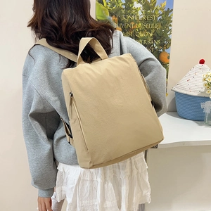 Fashionable beige nylon backpack for women with large capacity for travel and school use