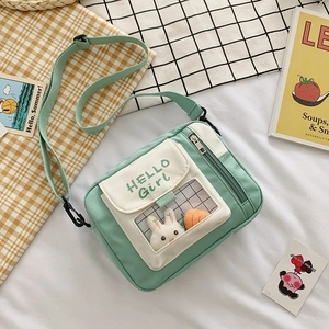 Sac bandoulière mignon en toile vert menthe et blanc avec poche transparente et lapin