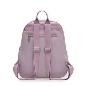 Minimalist lavender nylon backpack for women featuring adjustable straps and anti-theft pocket