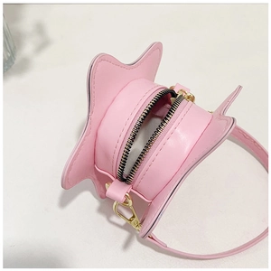 Detailed close-up showing the pink star-shaped bag interior with zipper and metal hooks