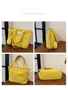Detailed four-way views of yellow canvas tote bag with matching round coin purse