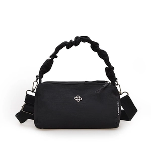 Minimalist black nylon handbag with stylish cloud handle and adjustable shoulder strap