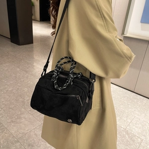 Black matte bowling bag with stylish rope handle and adjustable shoulder strap