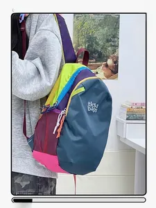 Side view of multi-color waterproof student backpack with mesh pockets and adjustable straps