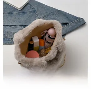 Top view of plush crossbody bag showing large capacity for umbrella and cosmetics
