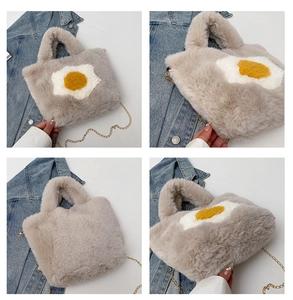 Detail of plush crossbody bag featuring fried egg motif and gold metal chain strap