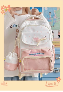 Pink star pattern backpack with clear pocket for pins and matching drawstring bag