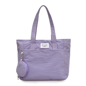 Lightweight purple nylon tote bag for women with large capacity and mini coin purse charm