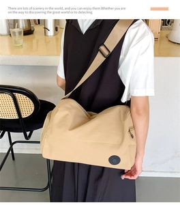 Khaki large capacity nylon crossbody bag with adjustable strap and logo for daily commute