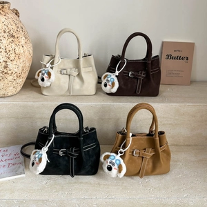 Minimalist pleated crossbody bag in four suede colors with a cute puppy charm