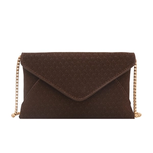 Minimalist dark brown envelope crossbody bag with woven texture and gold chain strap
