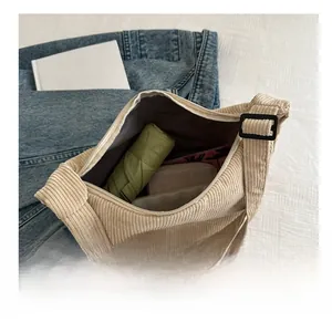Spacious beige corduroy tote showing interior with umbrella and wallet details