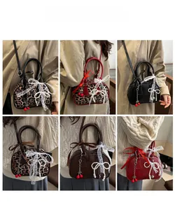 Collage of chic shoulder bags with cherry charms and lace bows in various colors