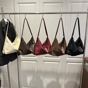 Vintage crescent shoulder bags in five colors with adjustable straps for women