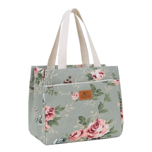 Floral canvas bucket tote bag with rose print and front zipper pocket for lunch box