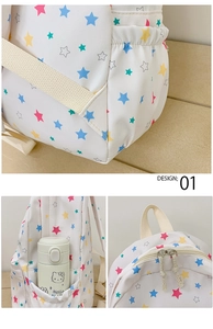 Detail view showing star pattern backpack fabric, side pocket for bottles and zipper design
