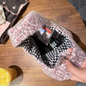Chic pink leopard print faux fur tote bag with stylish black and white checkered lining