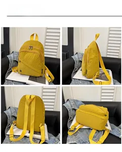 Detailed views showing the front, side, back and bottom of this bright yellow nylon backpack