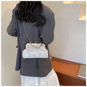 Retro light blue floral jacquard shell bag featuring a gold chain and metal ring handle
