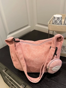 Pink corduroy crossbody bag set with adjustable strap and small round coin purse