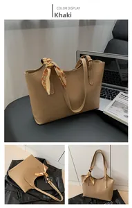 Khaki PU leather tote bag with elegant floral scarf detail for daily commute look