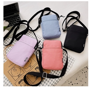 Vertical nylon crossbody mini phone bags in purple, blue, pink, and black colors
