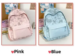 Detailed comparison of pink and blue campus backpacks with moon and star patterns