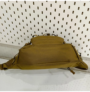 Top view of coyote tan tactical waist bag featuring high-density nylon and buckles