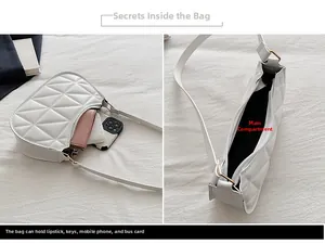 Détail de l'intérieur du sac matelassé blanc montrant sa grande capacité de rangement