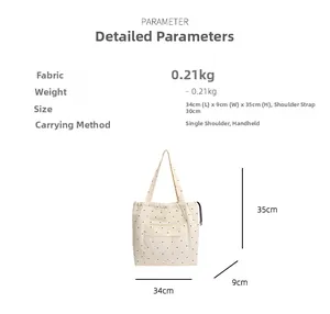 Polka dot canvas tote bag dimensions showing 34cm length and 35cm height with carry handle