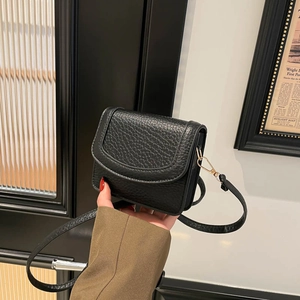 Minimalist black pebble grain small square crossbody bag with adjustable shoulder strap