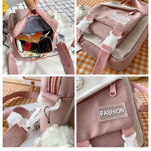 Detailed views of pink canvas crossbody bag showing interior capacity and strap buckle