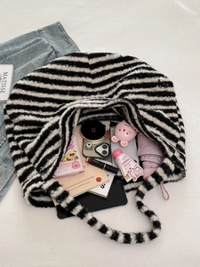 Large fuzzy striped tote bag in black and white teddy fleece with spacious interior