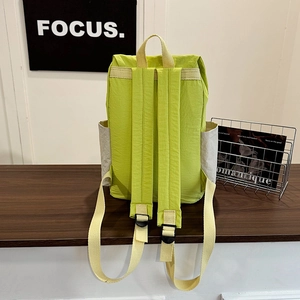 Minimalist light green travel backpack with adjustable straps and high capacity