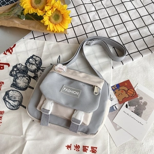 Japanese style canvas crossbody bag in gray and beige with adjustable wide strap
