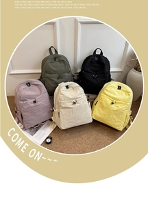 Group display of lightweight nylon travel backpacks in multiple colors for outdoor leisure