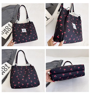 Detailed views of cherry print tote bag with metal chain strap and large capacity