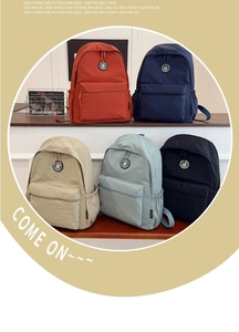 Detail showcasing the five color variations of the nylon commuter backpack set