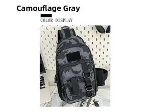 Detail view of camouflage grey tactical crossbody bag with multiple zippers and D-rings