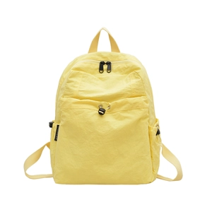 Waterproof yellow nylon backpack for outdoor travel with multiple functional pockets