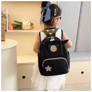 Close-up of children backpack with cute animal ears and adjustable khaki straps
