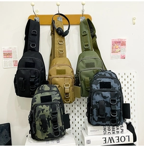 Detail showing five tactical crossbody bags in different colors with MOLLE system webbing
