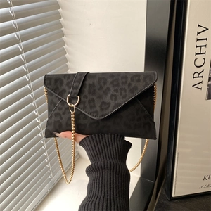 Fashionable black leopard print envelope clutch bag with gold chain strap for women